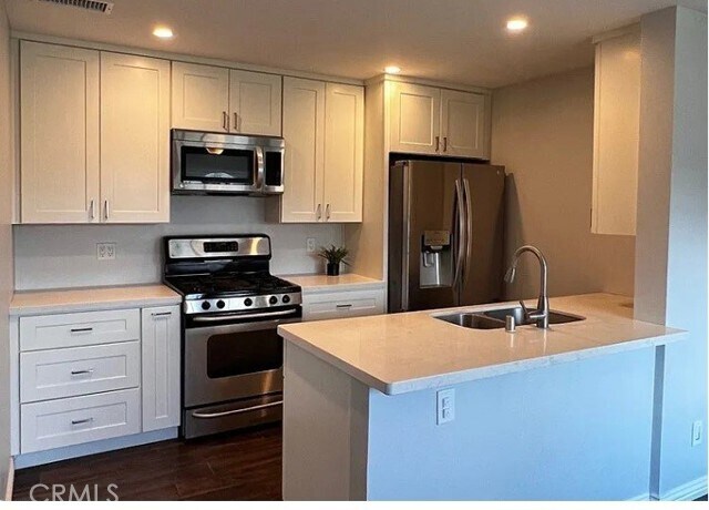 Foto principal - 15225 Santa Gertrudes Ave