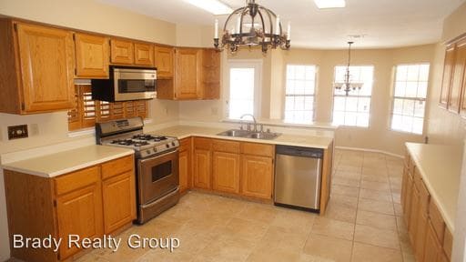 Building Photo - 5421 Singing Hills Dr