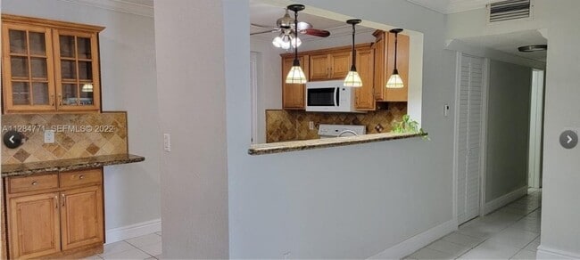 Photo - 10835 SW 41st Terrace Apartment