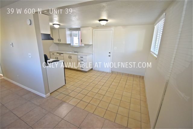 Building Photo - Remodeled 2 Bedroom Orem Unit! No Deposit ...