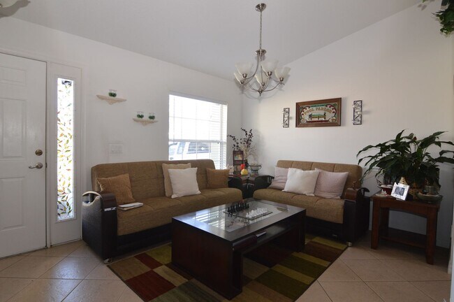 Building Photo - 4 BR + den $2,700