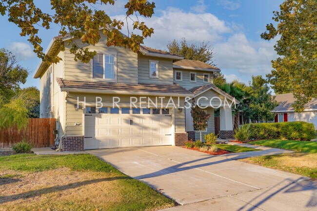 Building Photo - Bright Craftsman-Style 4 Bedroom Home in Q...