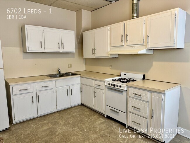Foto del edificio - Bi-level 1 bedroom apartment with huge bas...