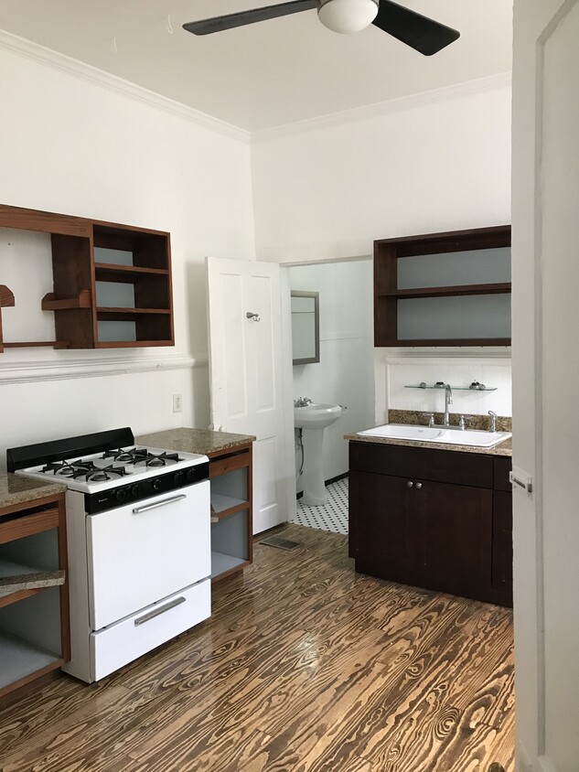 Fridge, marble counters, hand made cabinets + gas stove - 2214 Valence St