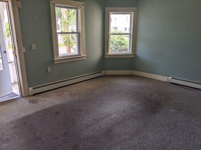 New living room carpet being put in. - 10 Arbor St