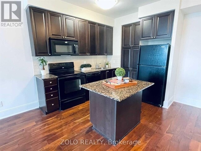 Photo du bâtiment - 330-330 Burnhamthorpe Rd W