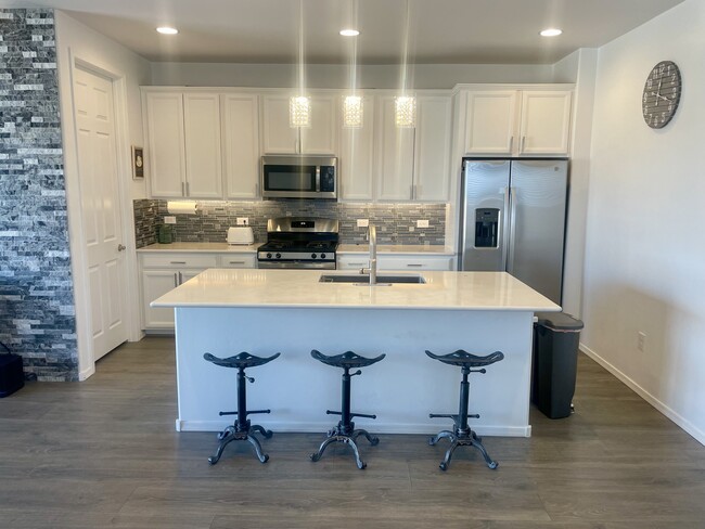 Kitchen with walk-in pantry - 11797 E Becker Dr