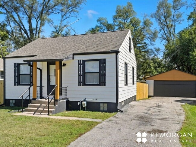 Photo - Stylish Updates + Spacious Yard + 2-Car Ga... House