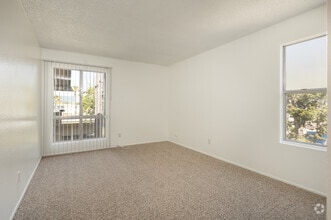 1BR, 1BA - 710SF - Primary Bedroom - Newport Village Apartments