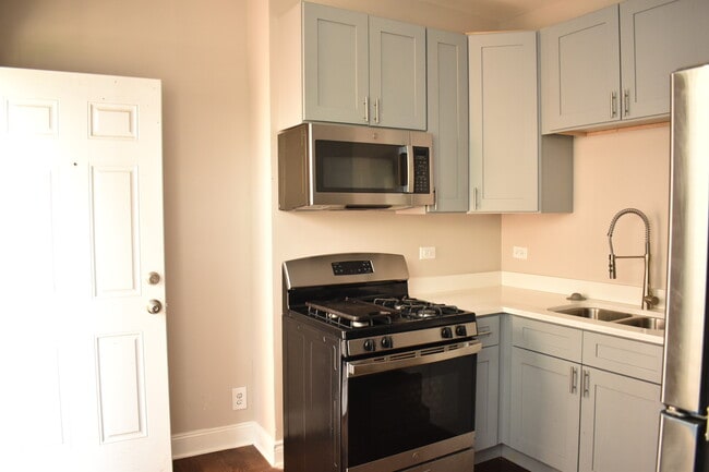 Building Photo - 11022 S Vernon Ave