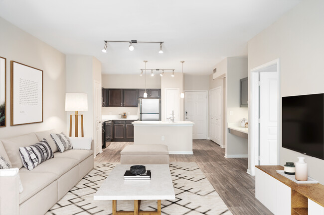 Kitchen and living room with hard surface vinyl plank flooring - Avalon at Pier 121