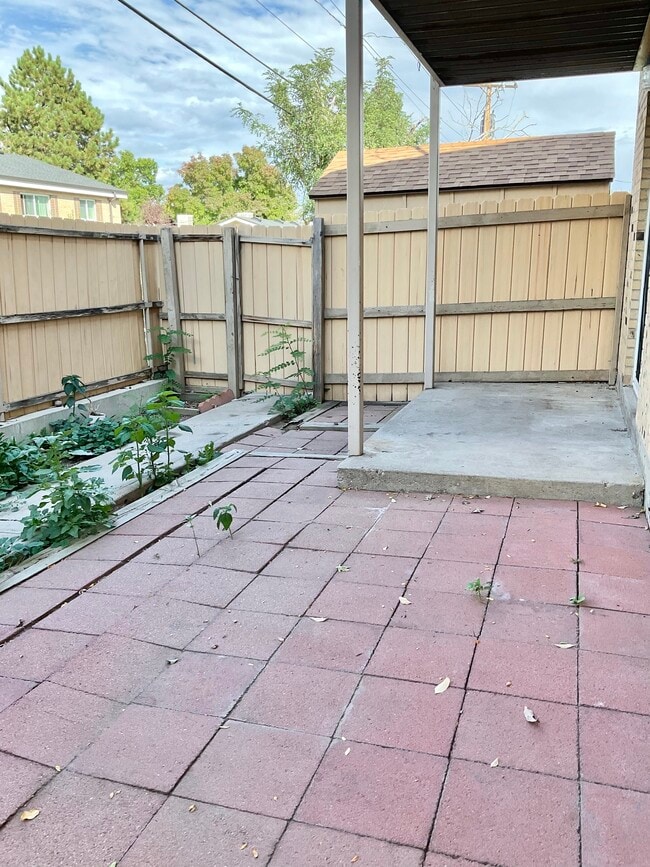 Transform your outdoor living with this charming patio and garden area, perfect for relaxation and entertaining. - Villa Rosa