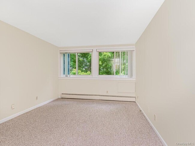 Foto del edificio - 9 Wyndover Woods Ln