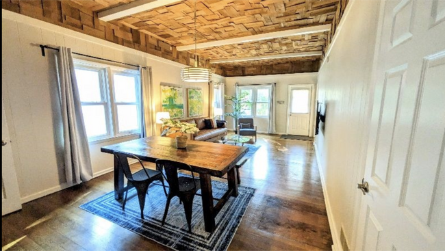Pottery Barn dining table opens onto the living room - 310 Toronto St