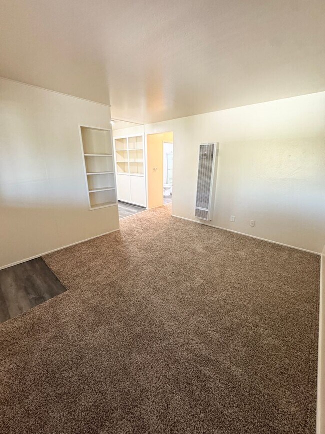 Building Photo - Move-In Special; Upstairs One Bedroom + Private Patio – SEE VIDEO