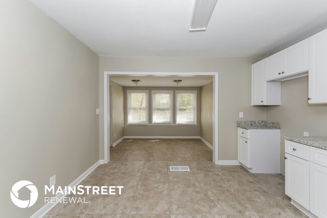 Foto del edificio - 6104 Holiday Blvd