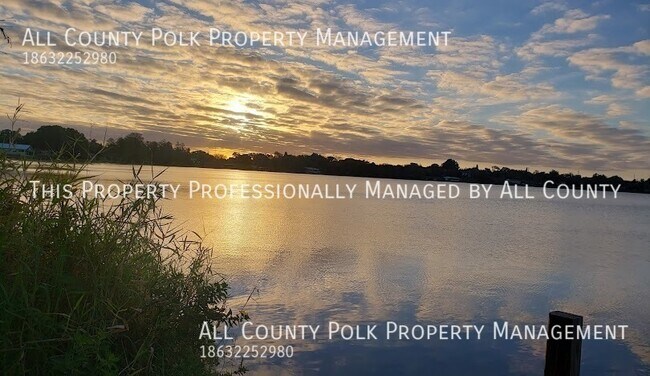 Building Photo - Enjoy Lakefront Living in This Spacious 4-...