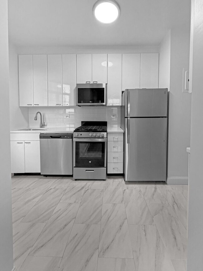 Building Photo - The Leslie — A Private Garden Enclave for the Modern New Yorker