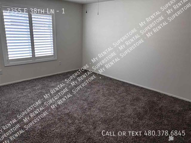 Building Photo - 7355 E 38th Ln