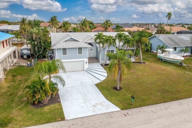 Building Photo - **Direct Gulf Access Pool Home! 4 BED/3 BA...