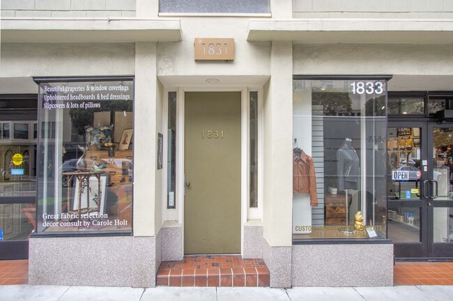 front entrance between ground floor retail - Polk / Jackson Apartments