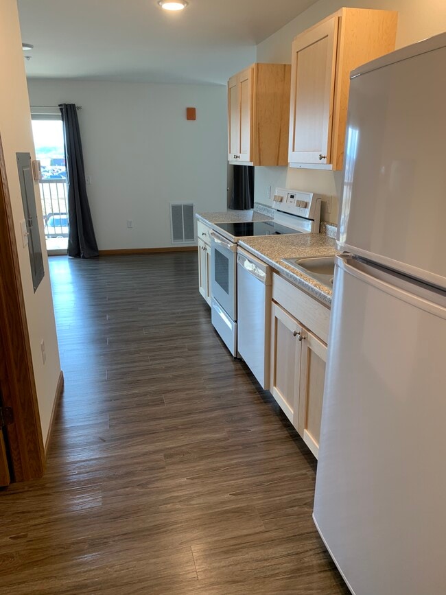 Entryway & Kitchen Area - Huntington Park Apartments