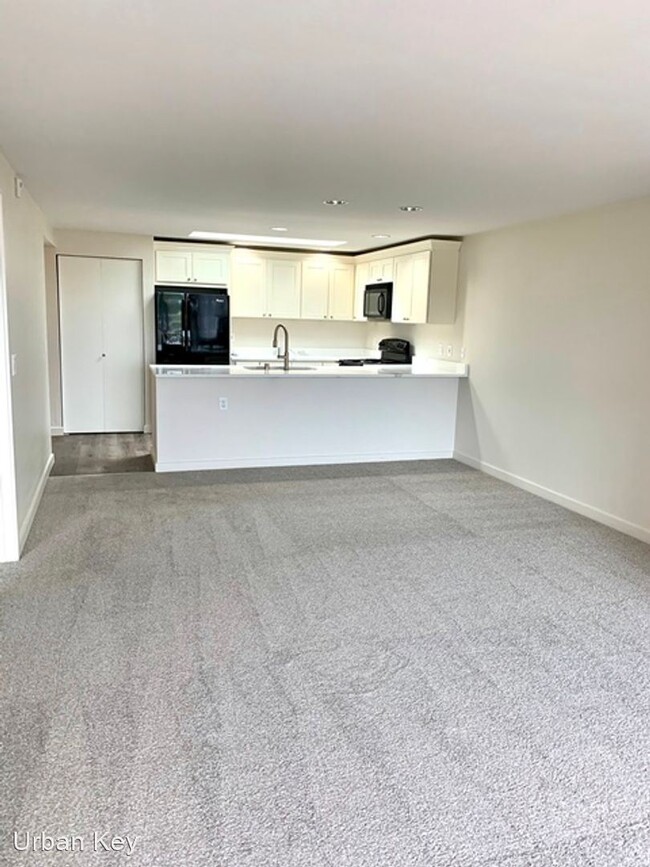 Foto del edificio - 2 br, 1.5 bath House - 4557 45th Ave SW Un...