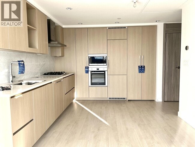 Building Photo - 4720 Lougheed Hwy.