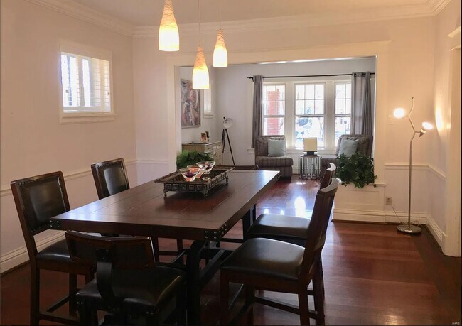 Dining room and view of living room - 7023 Pershing Ave