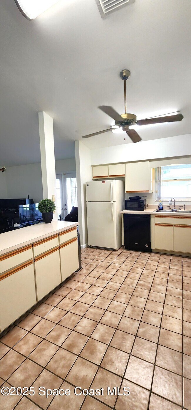 Building Photo - 7746 Mango Grove Ave