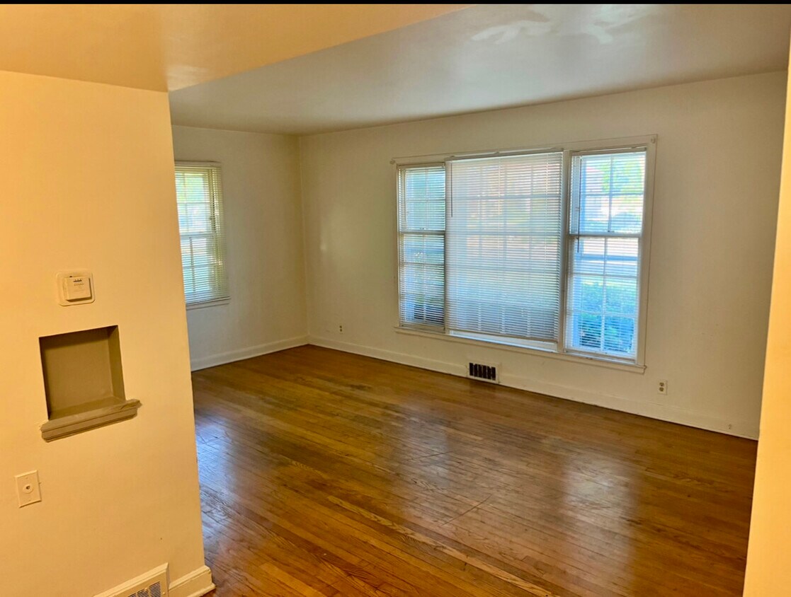 Bright and open living room. - 4025 N Sherman Blvd