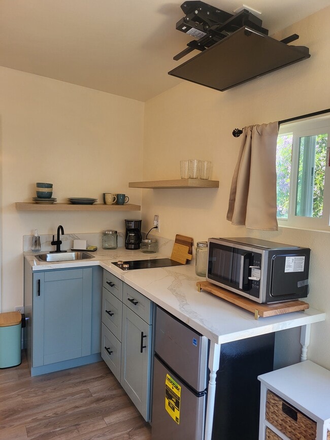 Kitchenette with TV up - 950 Barrett Ave