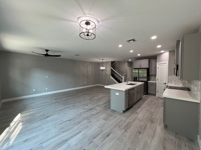 Building Photo - Upscale Modern Townhome located at Aqua Be...