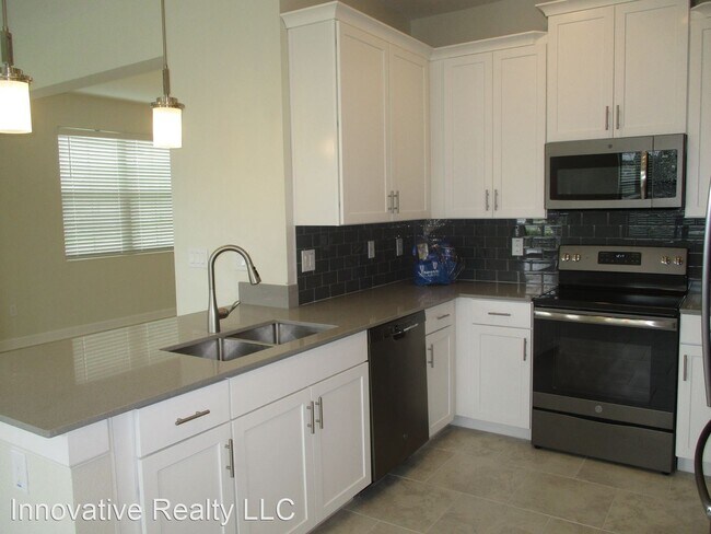 Building Photo - 4 br, 3.5 bath House - 11504 Whistling Pin...