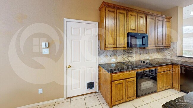 Foto del edificio - 8012 Spring Peaks Dr