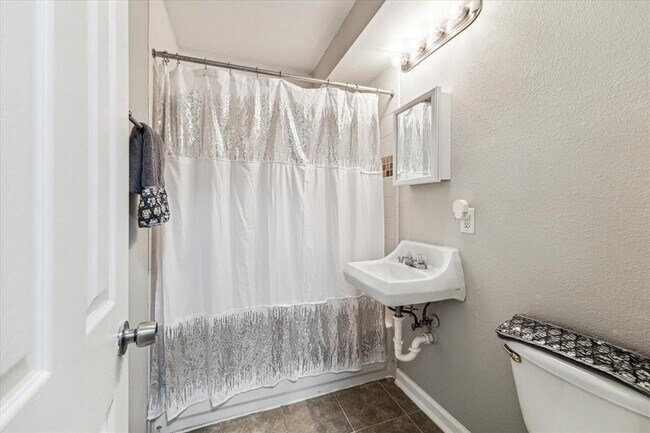 Photo - 1225 W 25th St Apartment