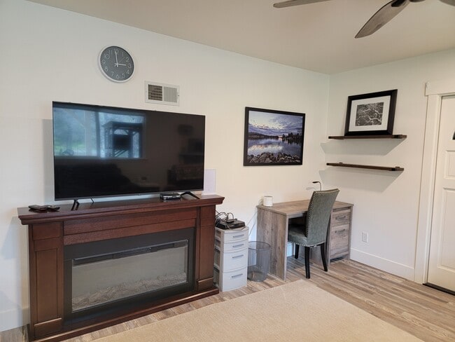 Desk for working and 55" TV with Electric fireplace - 10301 Wolf Dr