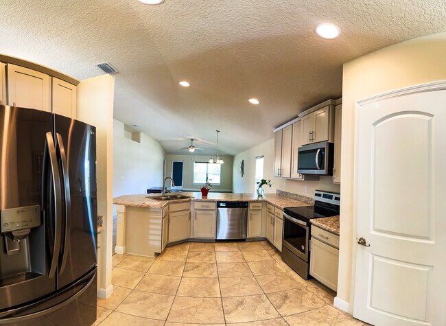 Building Photo - 825 NE Whistling Duck Way