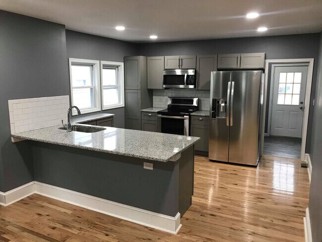 Building Photo - Completely renovated property! Two bath, s...