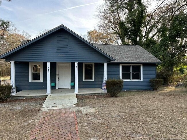 Building Photo - 413 Country Club Dr