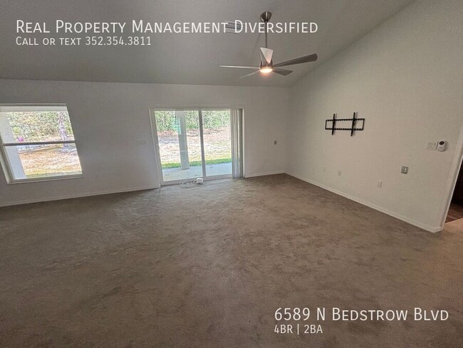 Building Photo - 6589 N Bedstrow Blvd