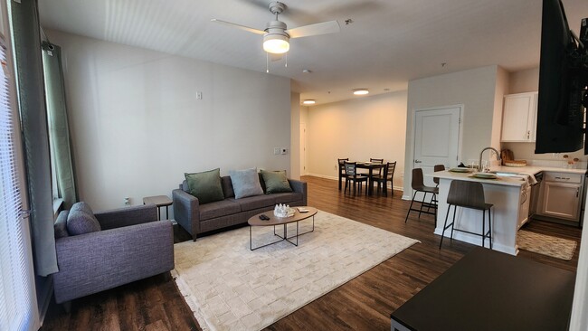 Relax in Fully Furnished Living Spaces with Modern Finishes and Roommate-Friendly Layouts - Walden Station Apts