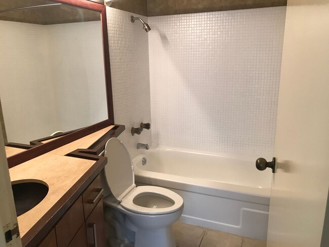 Building Photo - Century Center 1 Bdrm., 1 bath, 1 cov'd Pkg.