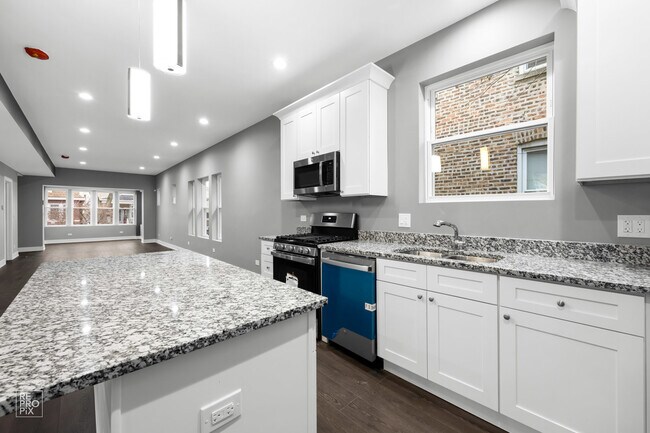 Building Photo - 7734 S Langley Ave