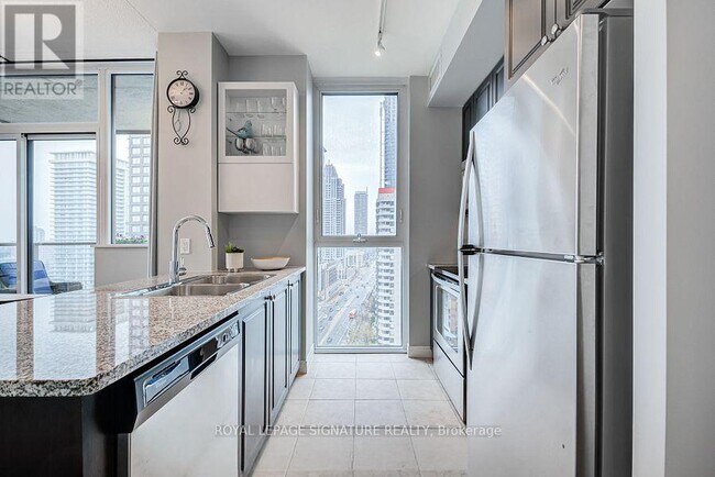 Photo du bâtiment - 339-1339 Rathburn Rd W