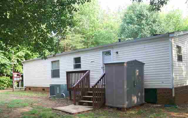 Building Photo - Large Three Bedroom, Two Bath On Wooded Lot