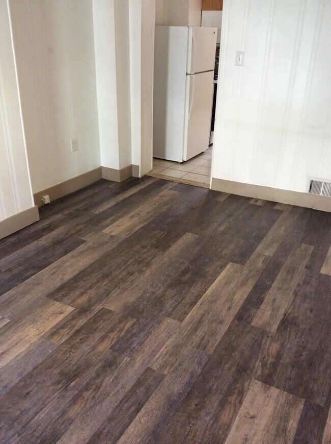 First Floor Living Room Front Door access attached to kitchen - 317 Darsie St