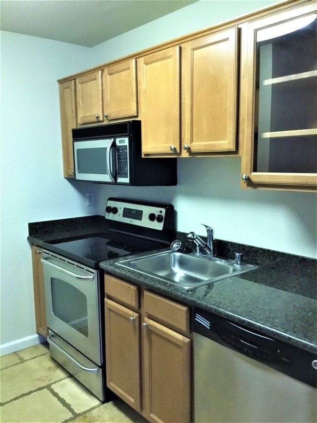 Building Photo - Studio at Baywood Villas