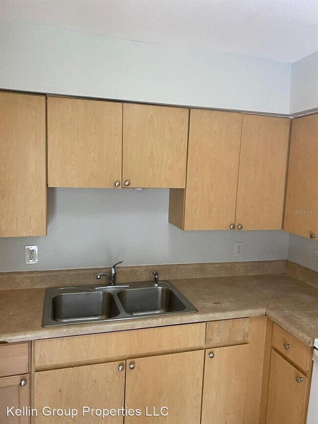 Building Photo - 10020 N Aster Ave
