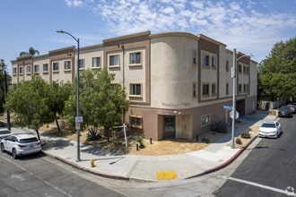 Building Photo - 7061 Woodman Ave